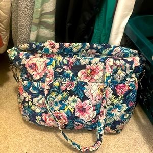 Vera Bradley diaper bag. Lots of pockets plus 2 insulated bottle holders
